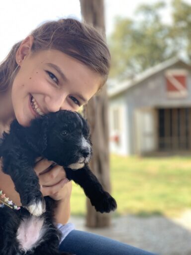 girl with puppy